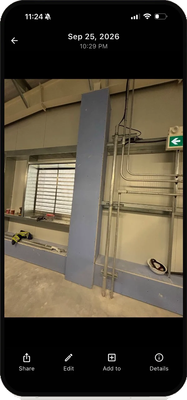 A site photo of a boarded column open full screen in the SubTrade app with share, edit, add to and details buttons